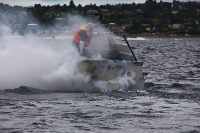 The smoke billowed from the stern of ’Topaz’ after they blew their turbo - Round One of the Rayglass NZ Offshore Powerboat Series<br />
Thunder on the Lake - Taupo  January 22nd 2011<br />
 © Cathy Vercoe LuvMyBoat.com http://www.luvmyboat.com